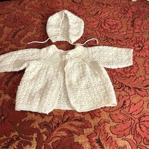 White newborn handknit sweater with cap